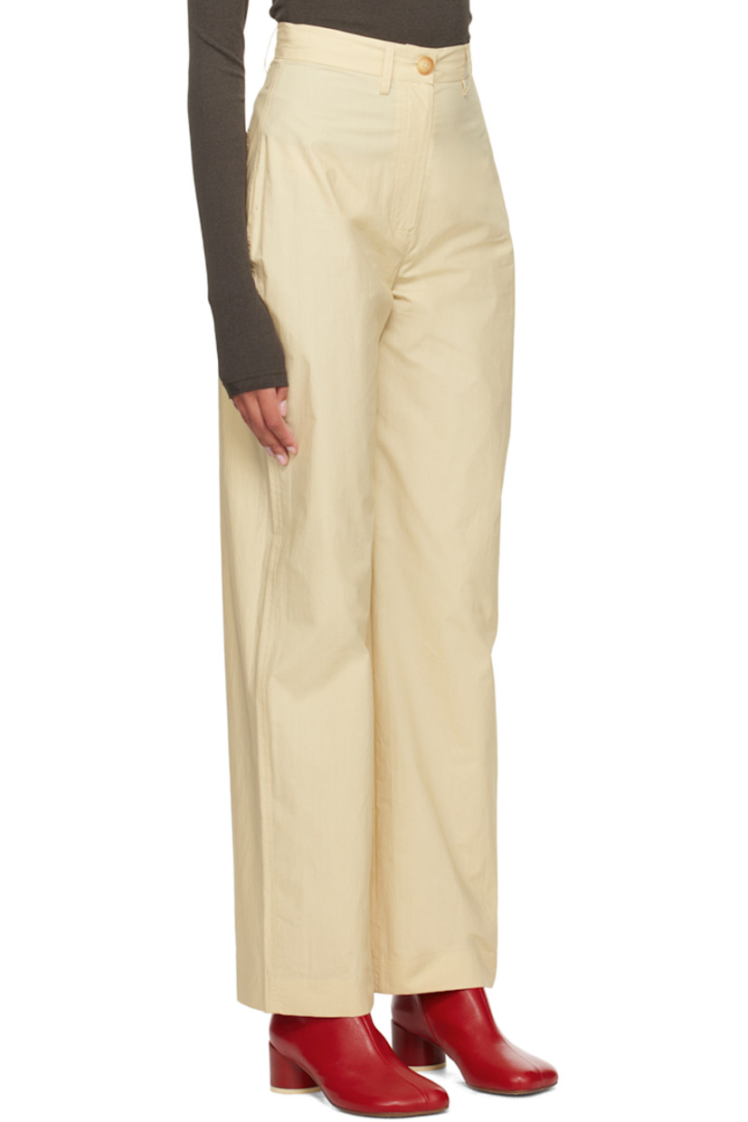 Straight-leg cotton poplin trousers.

· High-rise
· Belt loops
· Single-pocket styling
· Zip-fly
· Button detailing at side seam

Supplier color: Vintage creme