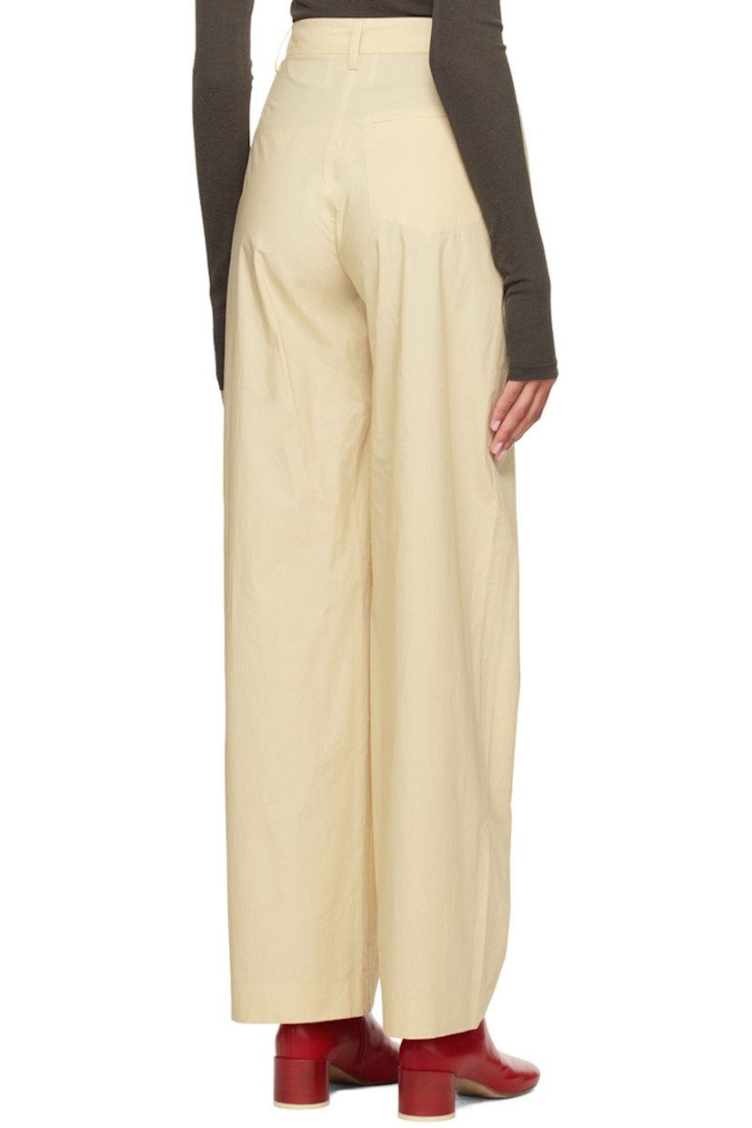 Straight-leg cotton poplin trousers.

· High-rise
· Belt loops
· Single-pocket styling
· Zip-fly
· Button detailing at side seam

Supplier color: Vintage creme