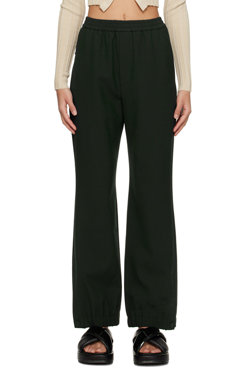 Plain-woven recycled polyester- and ECOVERO™ viscose-blend trousers. 

· Elasticized waistband 
· Three-pocket styling 
· Mock-fly 
· Press-stud vent at elasticized cuffs 
· Unlined 

Supplier color: Pine green