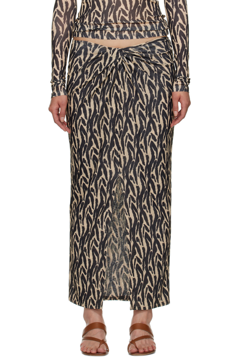 Semi-sheer recycled polyester skirt. Graphic pattern printed throughout.

· Layered construction
· Knotted detailing at elasticized waistband
· Central vent at front hem

Supplier color: Brushstroke animal