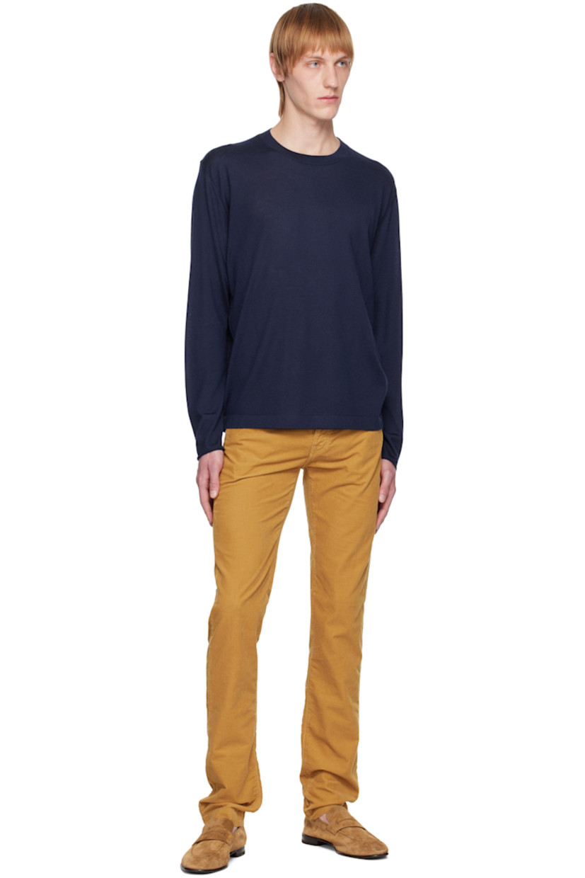 Cotton corduroy trousers. 

· Belt loops 
· Five-pocket styling 
· Button-fly 
· Leather logo patch at back waistband
· Cotton plain-woven pocket lining

Supplier color: Saffron