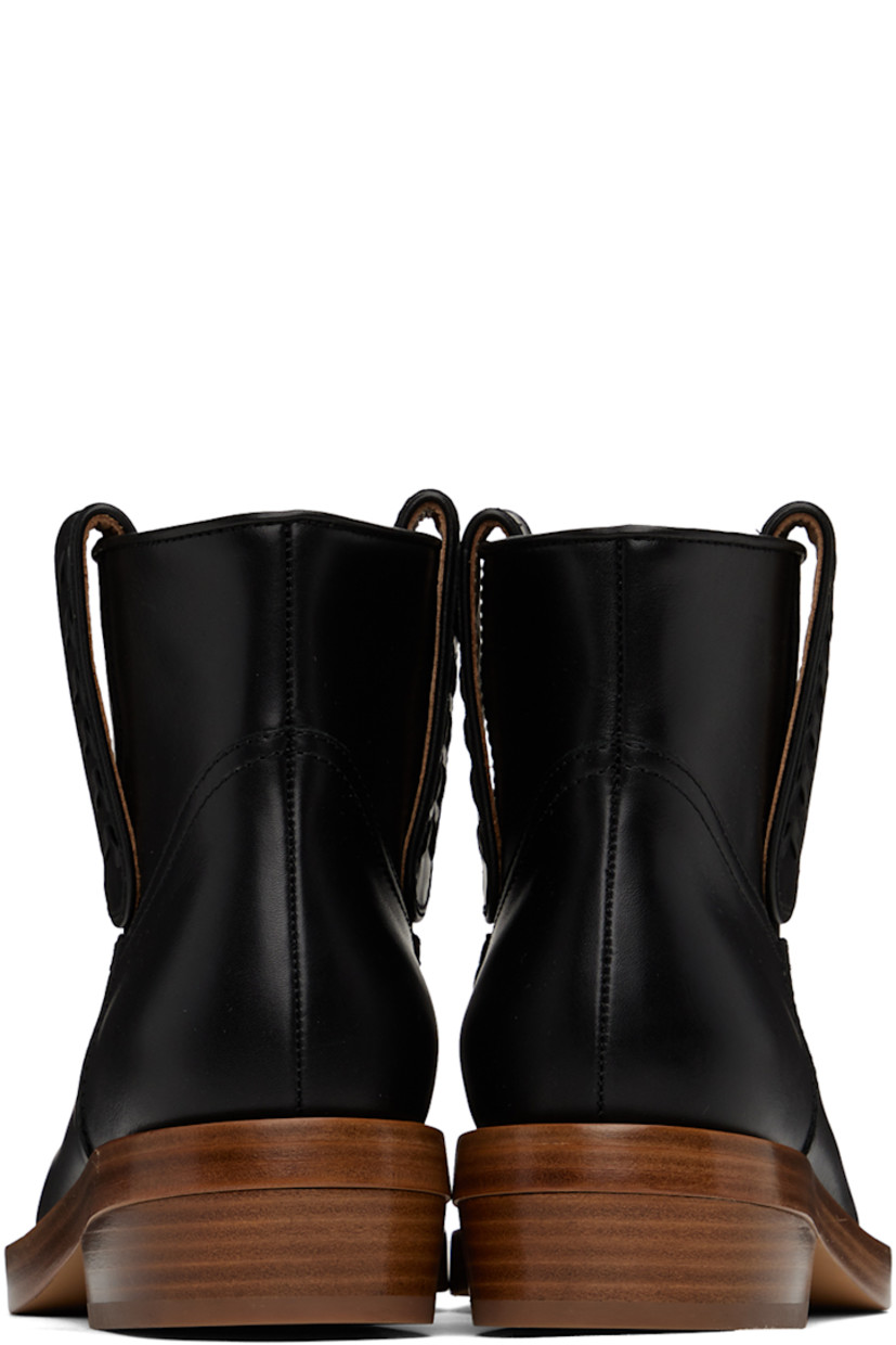 Ankle-high paneled buffed calfskin boots in black. 

· Almond toe
· Pull-loops with stitching at collar
· Grained calfskin lining
· Stacked leather block heel with rubber injection
· Leather sole
· Heel: H1 in

Supplier color: Black
