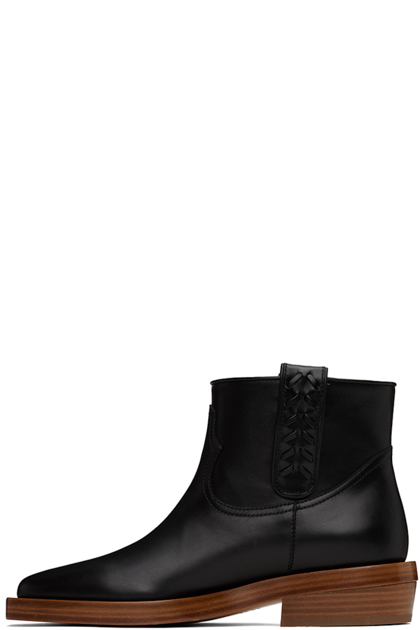 Ankle-high paneled buffed calfskin boots in black. 

· Almond toe
· Pull-loops with stitching at collar
· Grained calfskin lining
· Stacked leather block heel with rubber injection
· Leather sole
· Heel: H1 in

Supplier color: Black