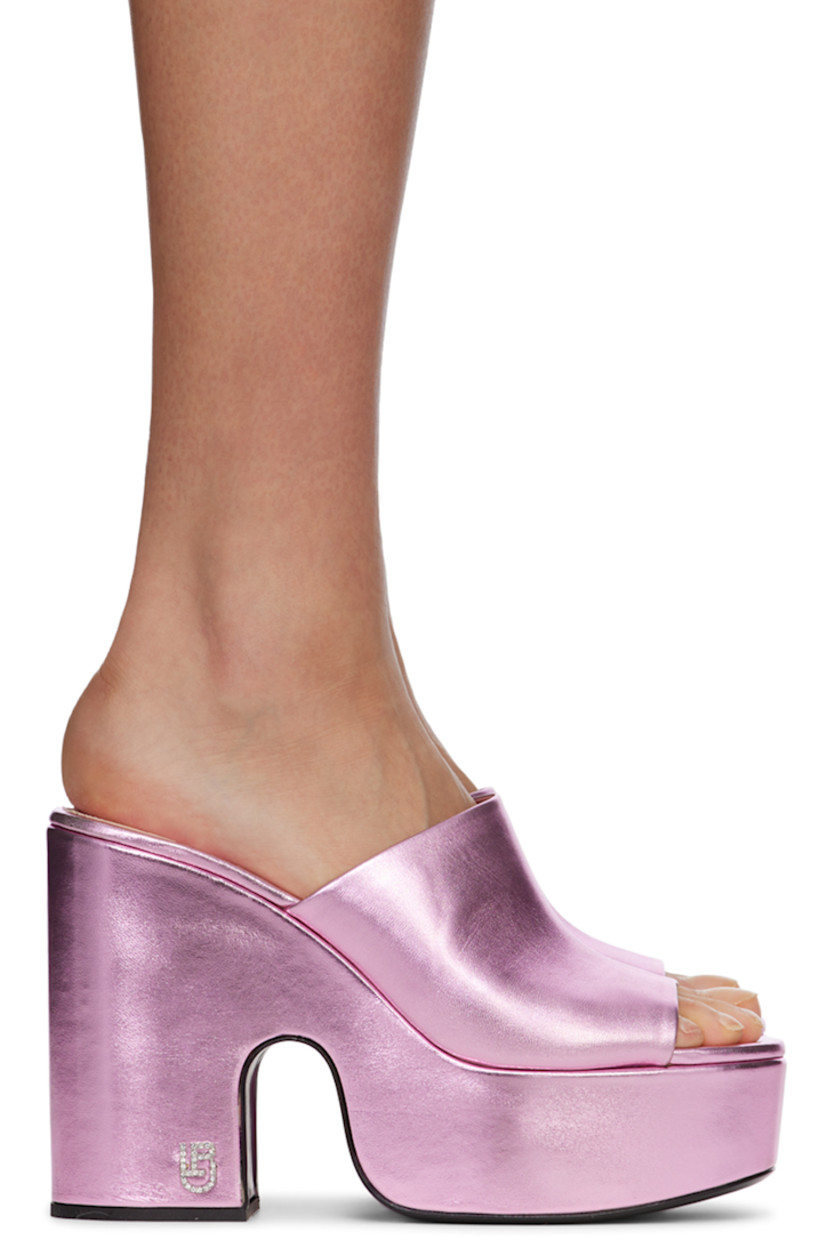 Grained lamé leather slip-on heeled sandals in pink. 

· Open round toe 
· Crystal-cut logo hardware at side
· Logo patch at leather footbed 
· Covered platform midsole 
· Covered block heel with rubber injection
· Leather outsole 
· Platform: H2 in
· Heel: H5 in 

Supplier color: Pink