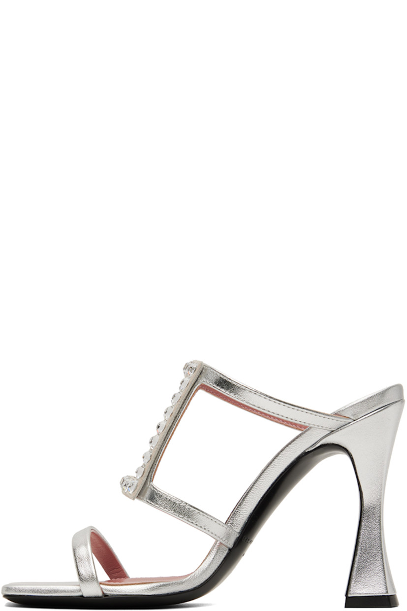 Grained nappa calfskin heeled sandals in silver.

· Open square toe
· Crystal-cut graphic appliqué at vamp
· Logo patch at padded footbed
· Covered heel with rubber injection 
· Leather outsole
· Heel: H3.75 in

Supplier color: Silver