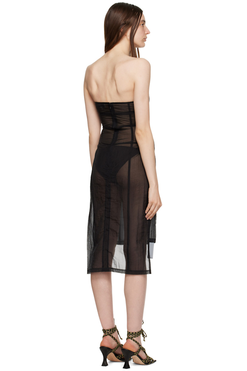 Handcrafted semi-sheer nylon organza dress.

· Straight neck
· Droptail hem
· Zip closure at back

Supplier color: Black