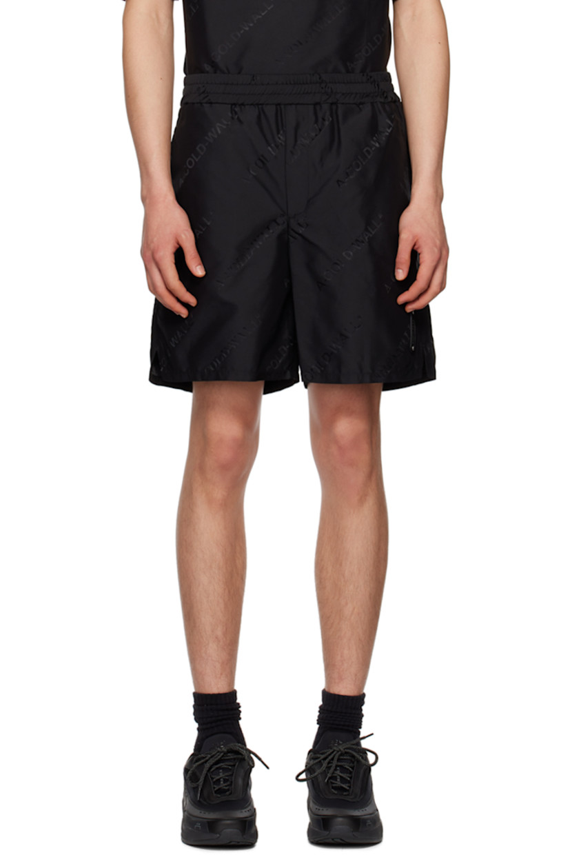 Nylon canvas shorts. Jacquard logo pattern throughout.

· Elasticized waistband
· Three-pocket styling
· Zip-fly
· Logo patch at front
· Vented cuffs

Supplier color: Black