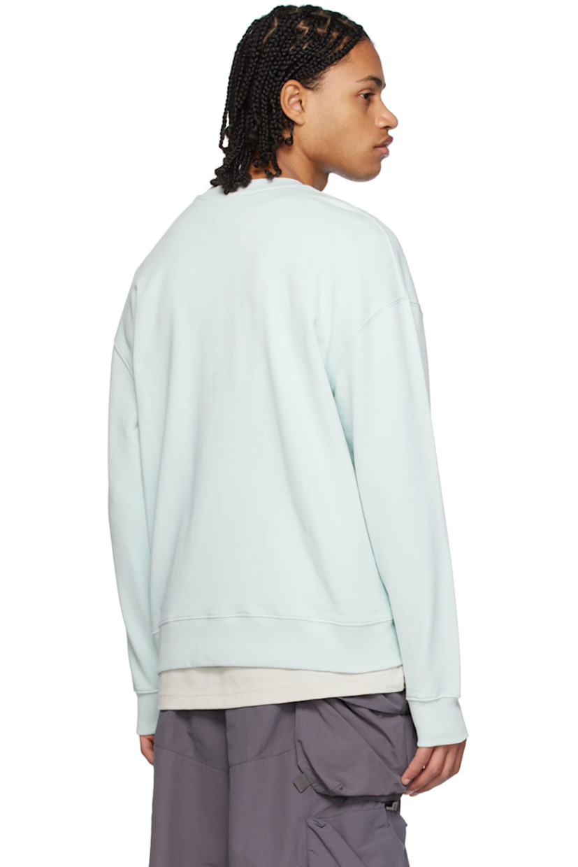 Relaxed-fit 340 gsm French terry sweatshirt. 

· Rib knit crewneck, hem, and cuffs
· Logo embroidered at chest and sleeves
· Dropped shoulders

Supplier color: Iceberg blue
