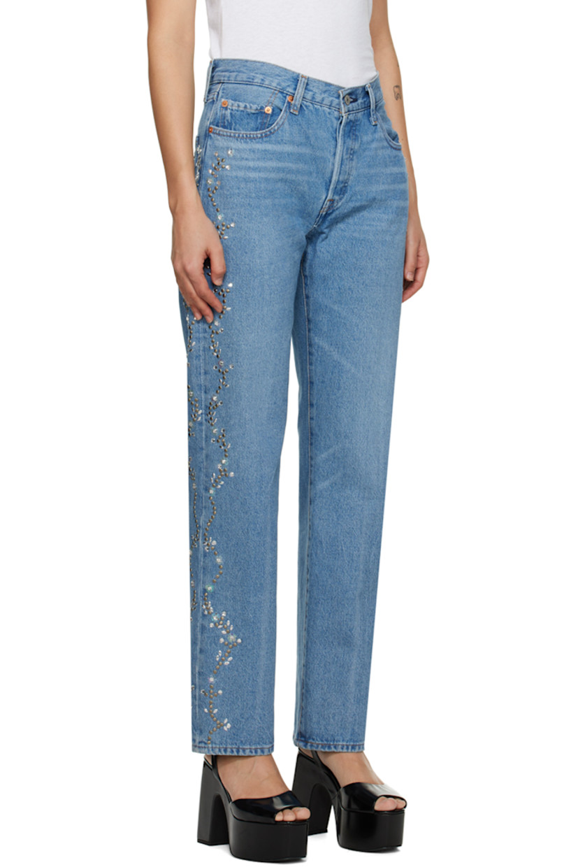 Non-stretch denim jeans. Studs and crystal-cut detailing throughout. 

· Belt loops
· Five-pocket styling
· Button-fly
· Logo patch at back waistband
· Logo flag at back pocket
· Logo-engraved bronze-tone hardware
· Contrast stitching in yellow 

Part of the Spring 2023 capsule collection.

Available exclusively at SSENSE. 

Supplier color: Blue