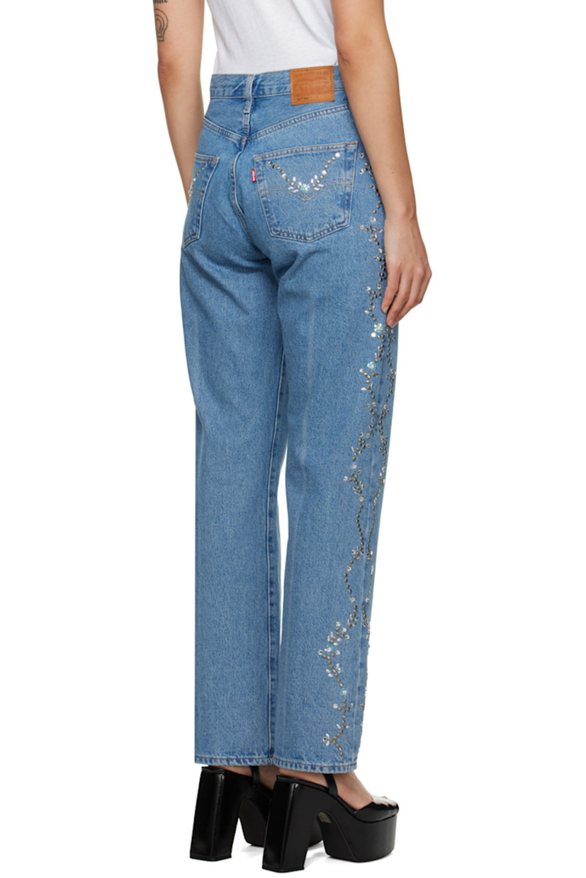 Non-stretch denim jeans. Studs and crystal-cut detailing throughout. 

· Belt loops
· Five-pocket styling
· Button-fly
· Logo patch at back waistband
· Logo flag at back pocket
· Logo-engraved bronze-tone hardware
· Contrast stitching in yellow 

Part of the Spring 2023 capsule collection.

Available exclusively at SSENSE. 

Supplier color: Blue