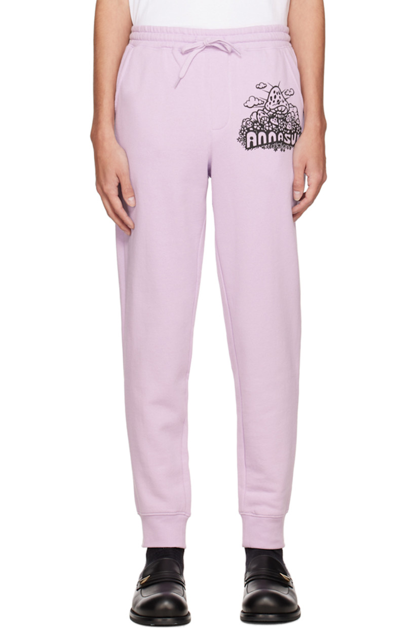 Cotton and polyester-blend fleece lounge pants. 

· Drawstring at elasticized waistband
· Three-pocket styling
· Mock-fly
· Logo graphic printed at front 
· Rib knit cuffs 

Available exclusively at SSENSE.

Supplier color: Lavender/Multi