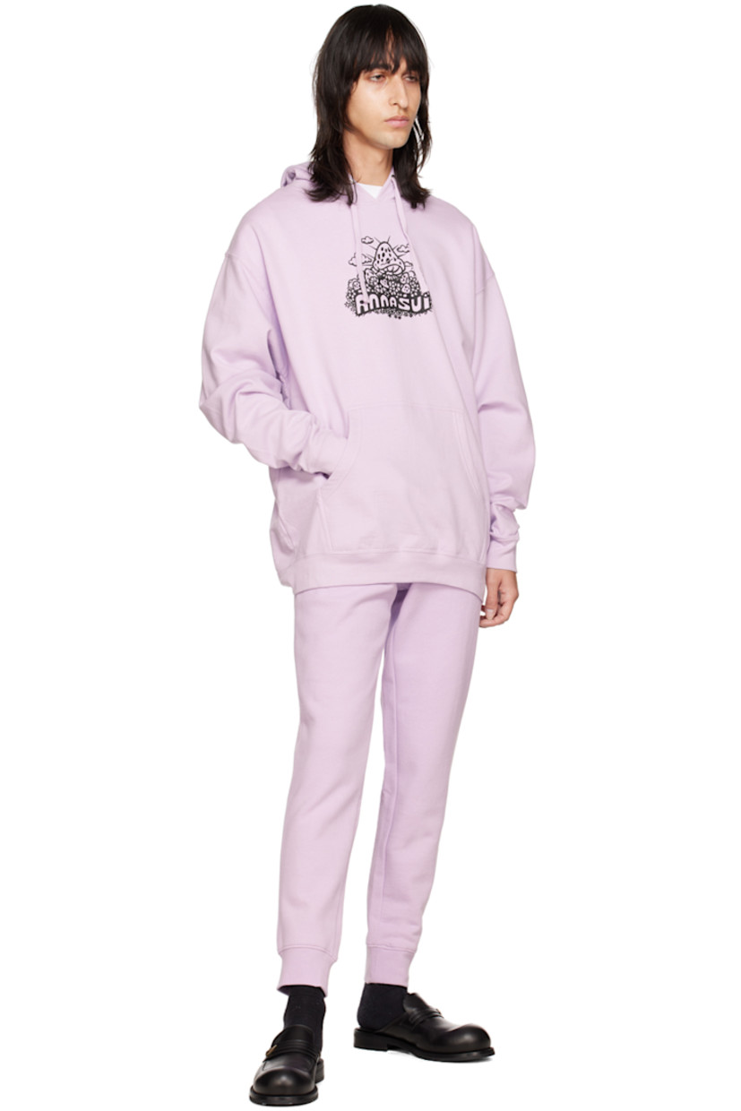 Cotton and polyester-blend fleece lounge pants. 

· Drawstring at elasticized waistband
· Three-pocket styling
· Mock-fly
· Logo graphic printed at front 
· Rib knit cuffs 

Available exclusively at SSENSE.

Supplier color: Lavender/Multi