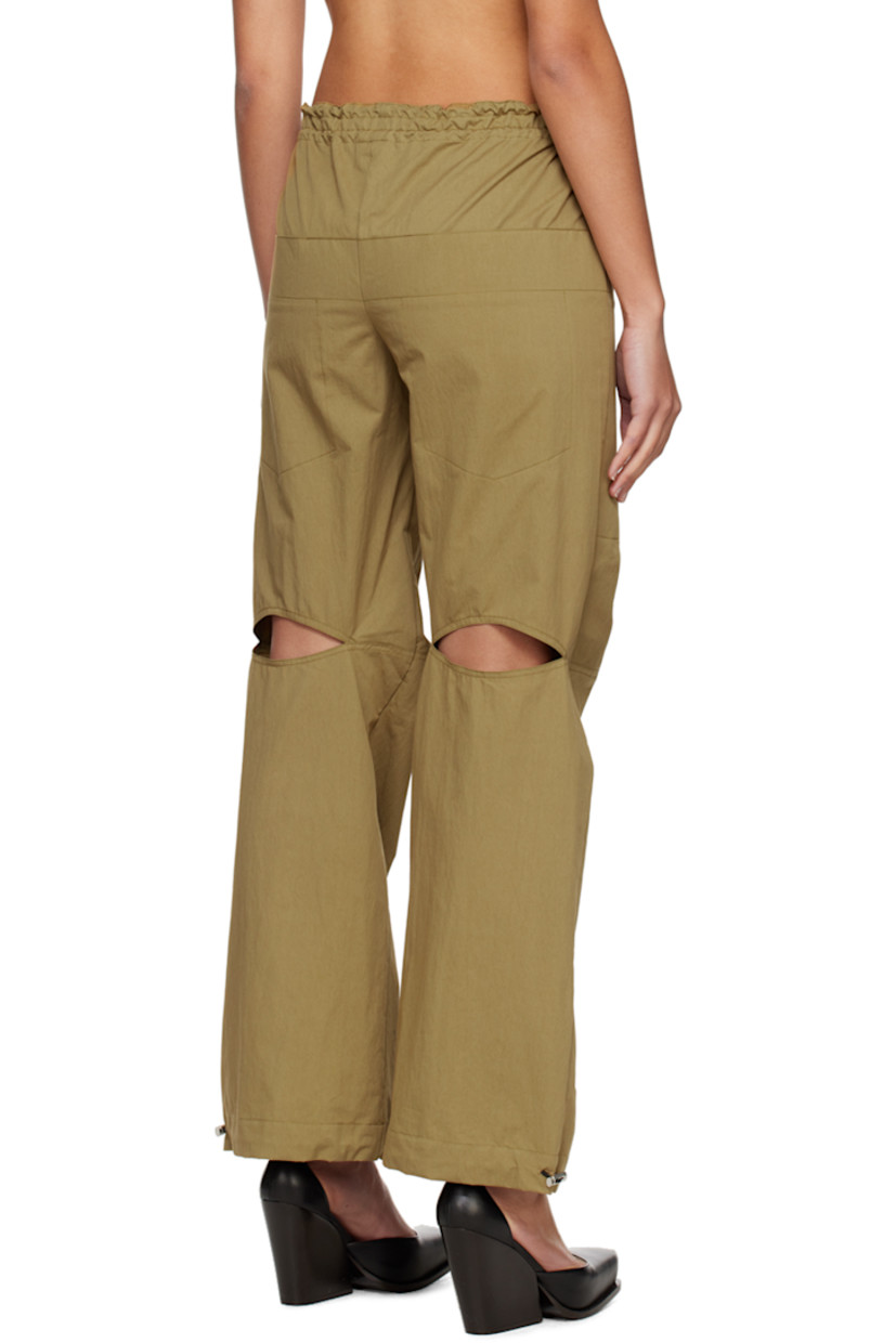 Cotton-blend twill lounge pants. 

· Bungee-style drawstring at elasticized waistband and cuffs
· Four-pocket styling 
· Bungee-style drawstring at cuffs 
· Cutout at back legs

Supplier color: Khaki