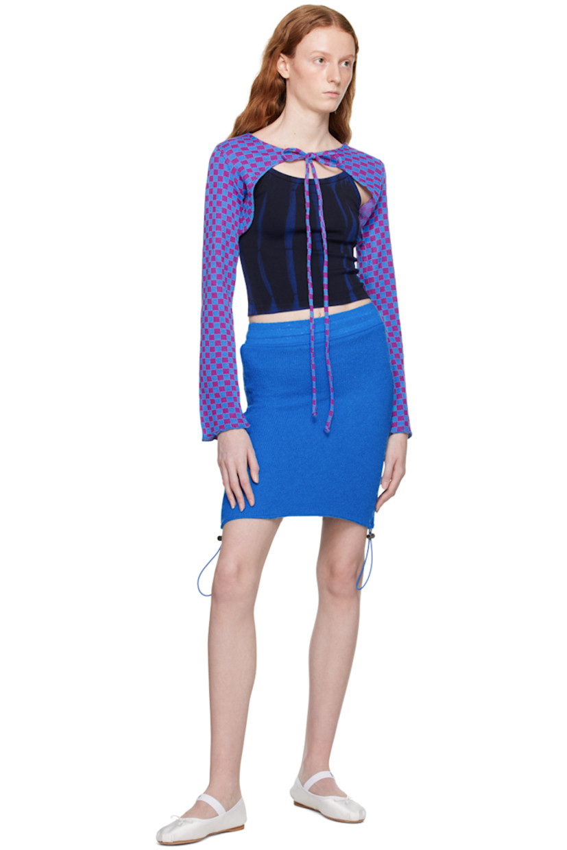 Rib knit acrylic-blend skirt. 

· Elasticized waistband
· Ruching and bungee-style drawstring at side seams
· Unlined

Supplier color: Cerulean