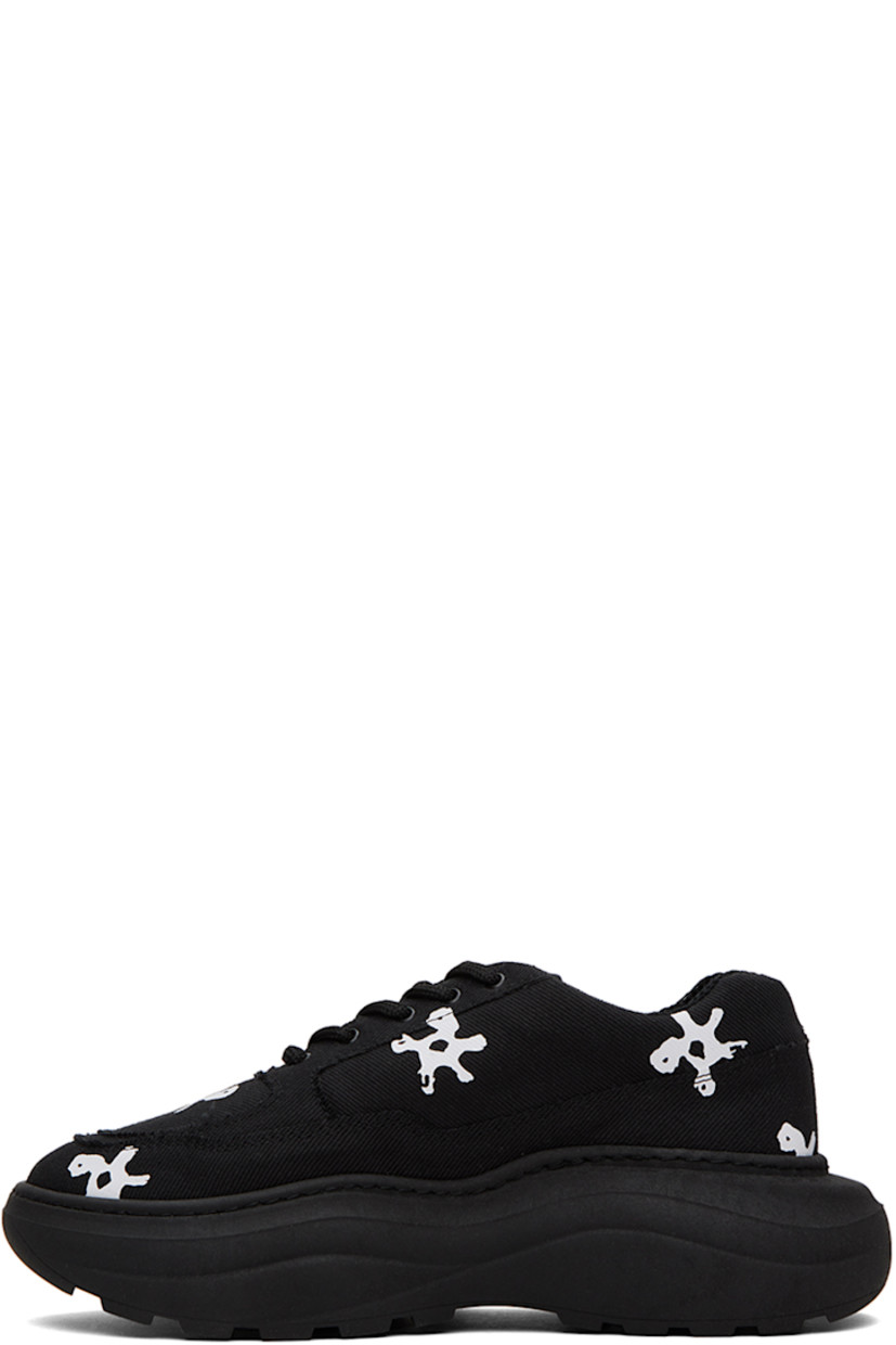 Low-top canvas sneakers in black. Raw edges and floral pattern printed throughout.

· Lace-up closure
· Padded tongue and collar 
· Logo embroidered at outer side
· Mesh lining
· Logo embossed at platform rubber midsole
· Treaded recycled rubber outsole
· Platform: H2 in 

Supplier color: White flower black