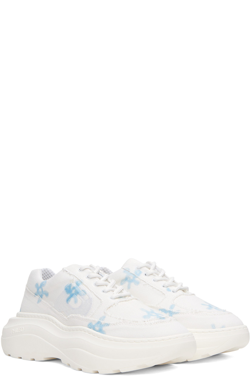 Low-top canvas sneakers in white. Raw edges and floral pattern printed throughout.

· Lace-up closure
· Padded tongue and collar 
· Logo embroidered at outer side
· Mesh lining
· Logo embossed at platform rubber midsole
· Treaded recycled rubber outsole
· Platform: H2 in 

Supplier color: Blue flower white