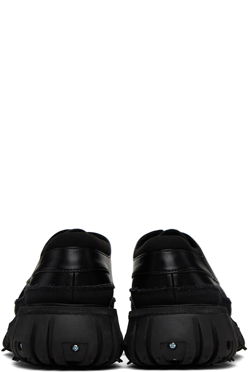 Buffed Apple Skin® faux-leather, faux-suede and canvas derbys in black. Raw edges throughout. 

· Moc toe
· Lace-up closure
· Padded collar
· Mesh lining
· Graphic hardware at rubber midsole
· Treaded recycled rubber outsole
· Silver-tone hardware

Supplier color: Black