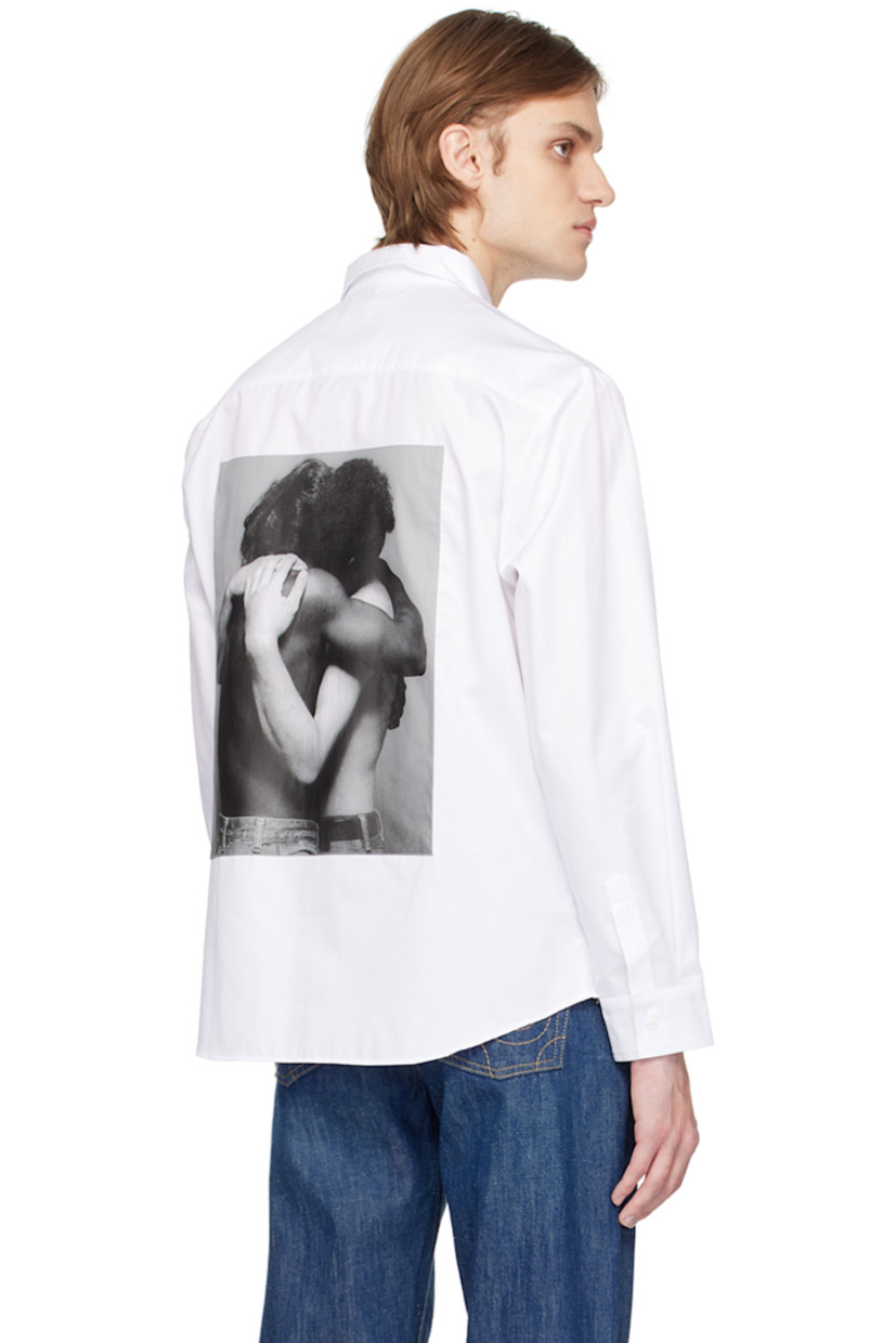 Cotton twill shirt. 

· Spread collar 
· Button closure 
· Logo printed at chest 
· Single-button barrel cuffs 
· Graphic printed at back 

Featuring artwork by Robert Mapplethorpe.

Supplier color: White