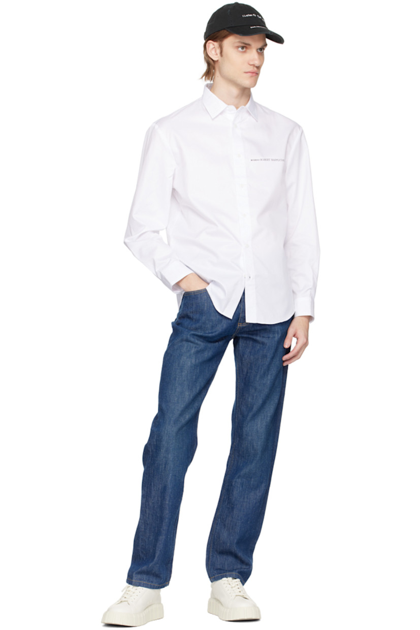Cotton twill shirt. 

· Spread collar 
· Button closure 
· Logo printed at chest 
· Single-button barrel cuffs 
· Graphic printed at back 

Featuring artwork by Robert Mapplethorpe.

Supplier color: White