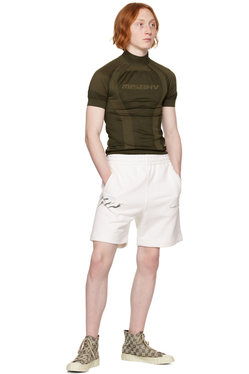 Cotton- and polyester-blend French terry shorts. 

· Concealed drawstring at elasticized waistband
· Three-pocket styling
· Mock-fly
· Logo and graphic printed at legs

Supplier color: Off white