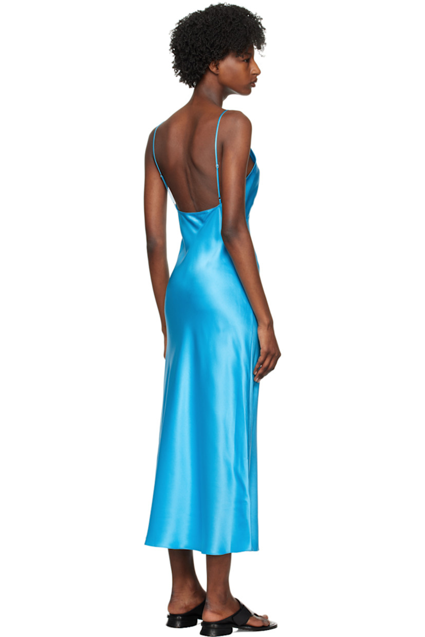 Paneled silk charmeuse dress.

· V-neck
· Darts at chest
· Adjustable spaghetti straps
· Low back

Supplier color: Azure