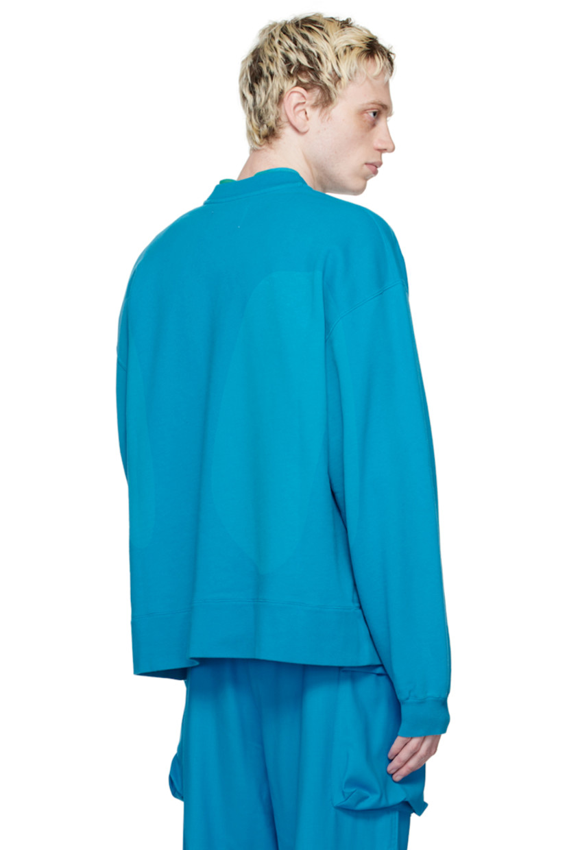 French terry sweatshirt. Graphic printed throughout.

· Rib knit crewneck, hem, and cuffs
· Logo printed at chest
· Dropped shoulders

Supplier color: Azure