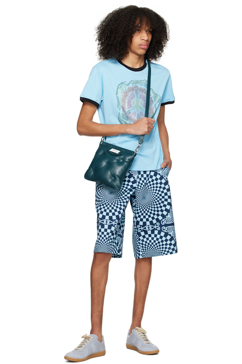 Cotton twill shorts. Graphic pattern printed throughout.

· Belt loops
· Four-pocket styling
· Zip-fly

Supplier color: Blue