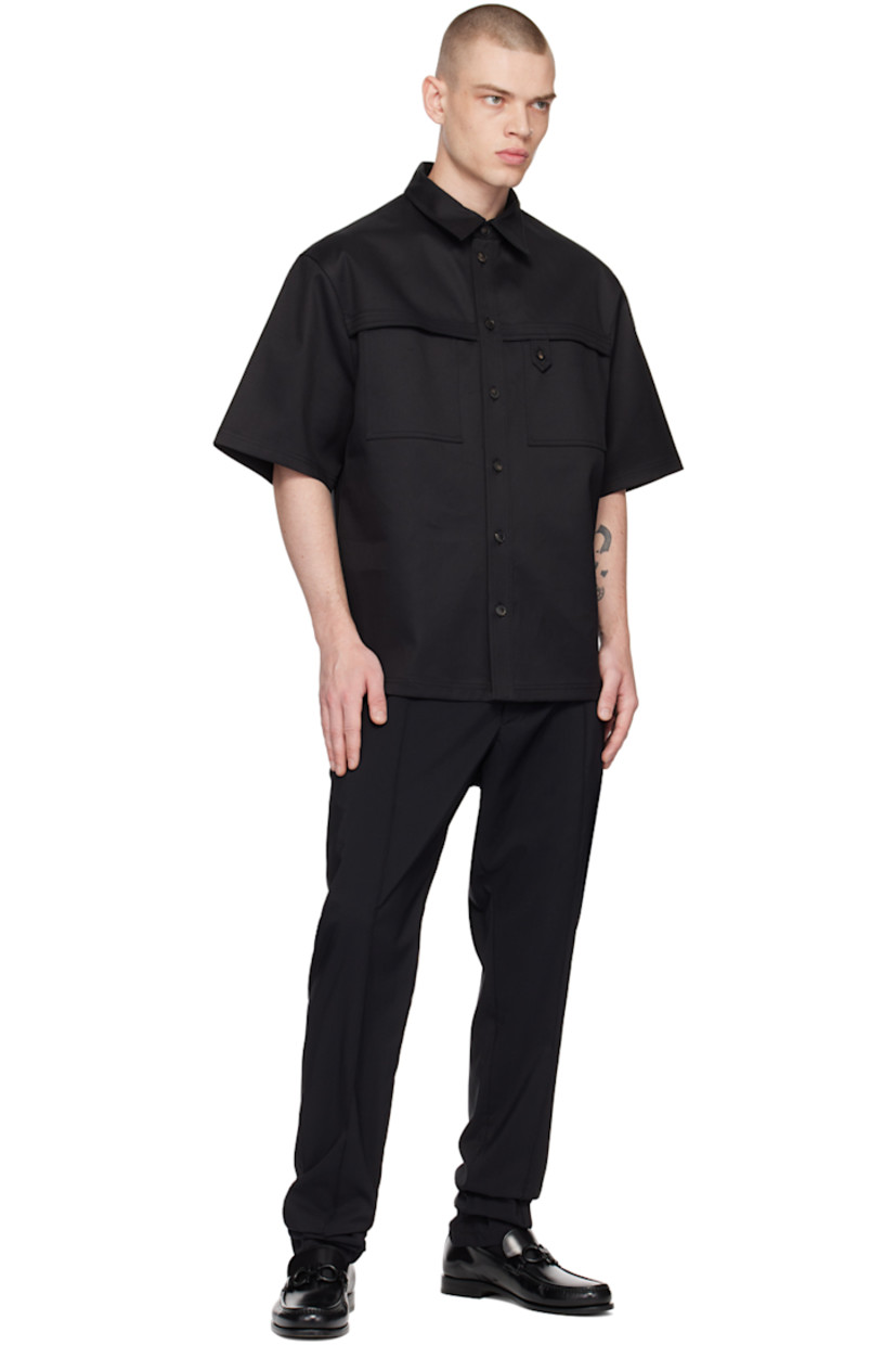 Virgin wool-blend ripstop trousers.

· Concealed drawstring at elasticized waistband
· Three-pocket styling
· Zip-fly
· Pinched seams at front

Supplier color: Nero