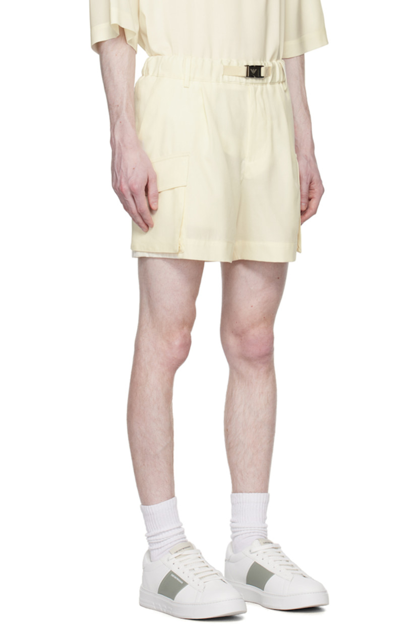 Wool gabardine shorts.

· Elasticized waistband
· Integrated grosgrain belt with press-release fastening
· Four-pocket styling
· Zip-fly
· Pleats at front
· Cargo pockets at outseams
· Logo embroidered at back

Supplier color: Bianco panna