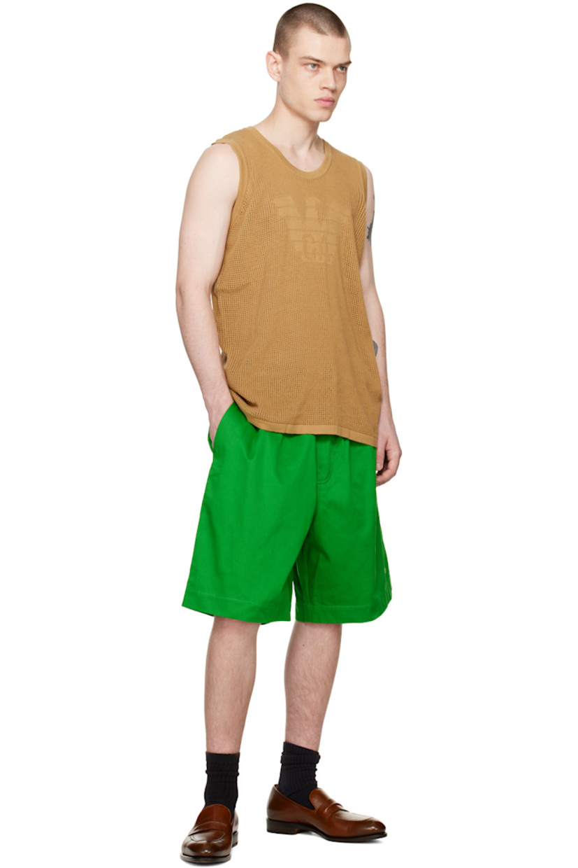 Open knit recycled cotton tank top.

· Rib knit crewneck, hem, and armscyes
· Intarsia logo at front

Part of the Sustainable collection.

Supplier color: Sabbia