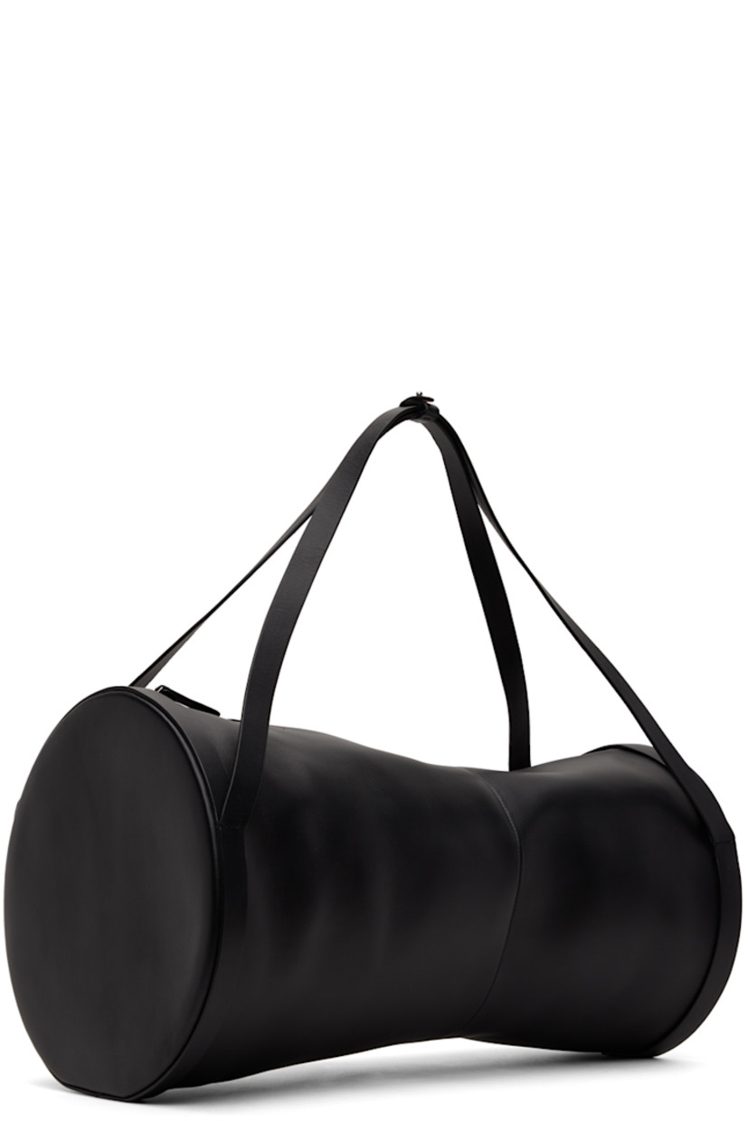 Structured buffed calfskin messenger bag in black. 

· Adjustable shoulder straps 
· Zip closure 
· Twill lining 
· H11 x W19.5 x D10 in 

Part of the ECCO.kollektive x Isaac Reina collaboration. 

Supplier color: Black