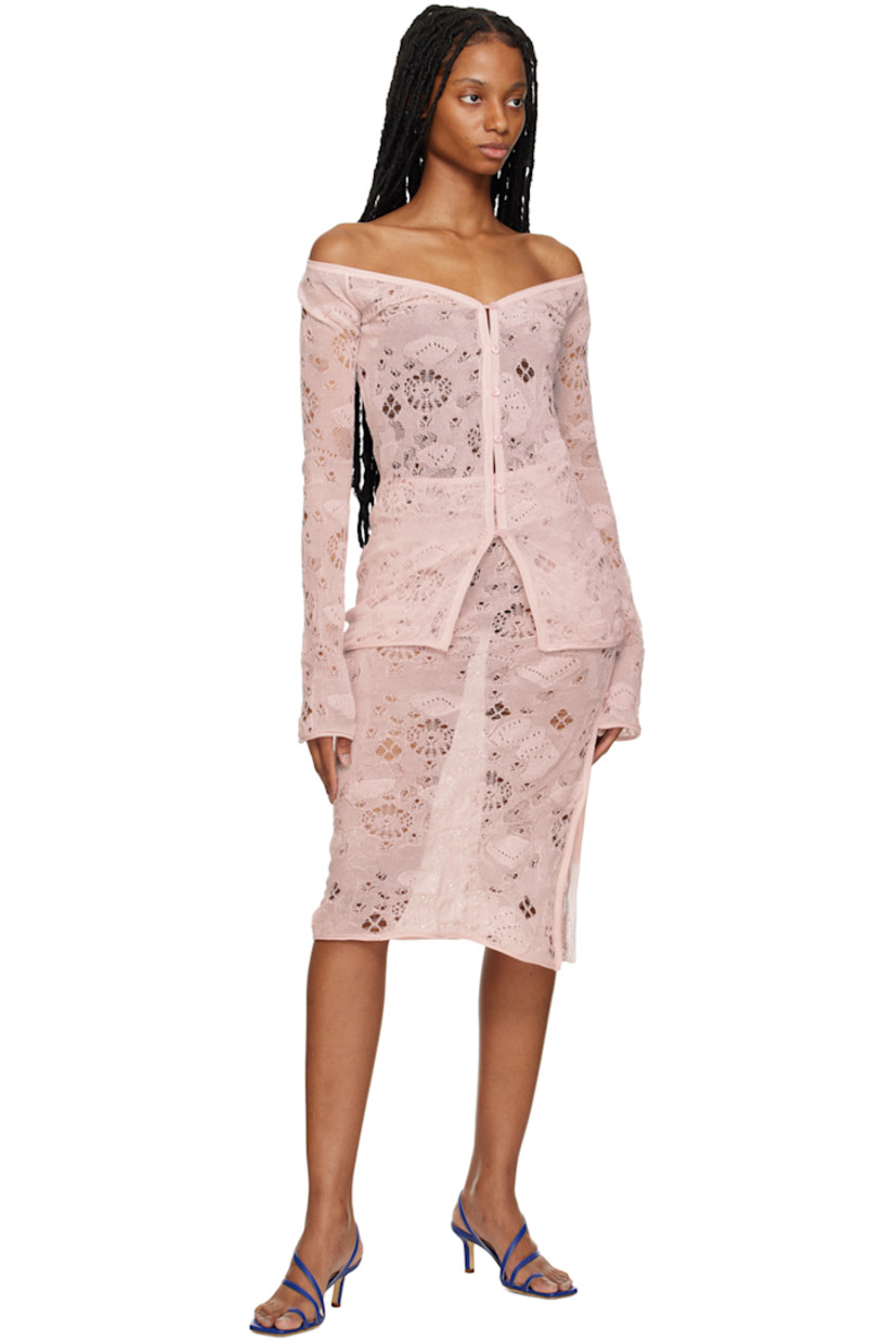 Semi-sheer open knit cotton- and nylon-blend skirt. Broderie anglaise detailing throughout.

· Elasticized waistband
· Rolled edge at hem
· Button closure at side
· Vented side seam

Supplier color: Blush pink