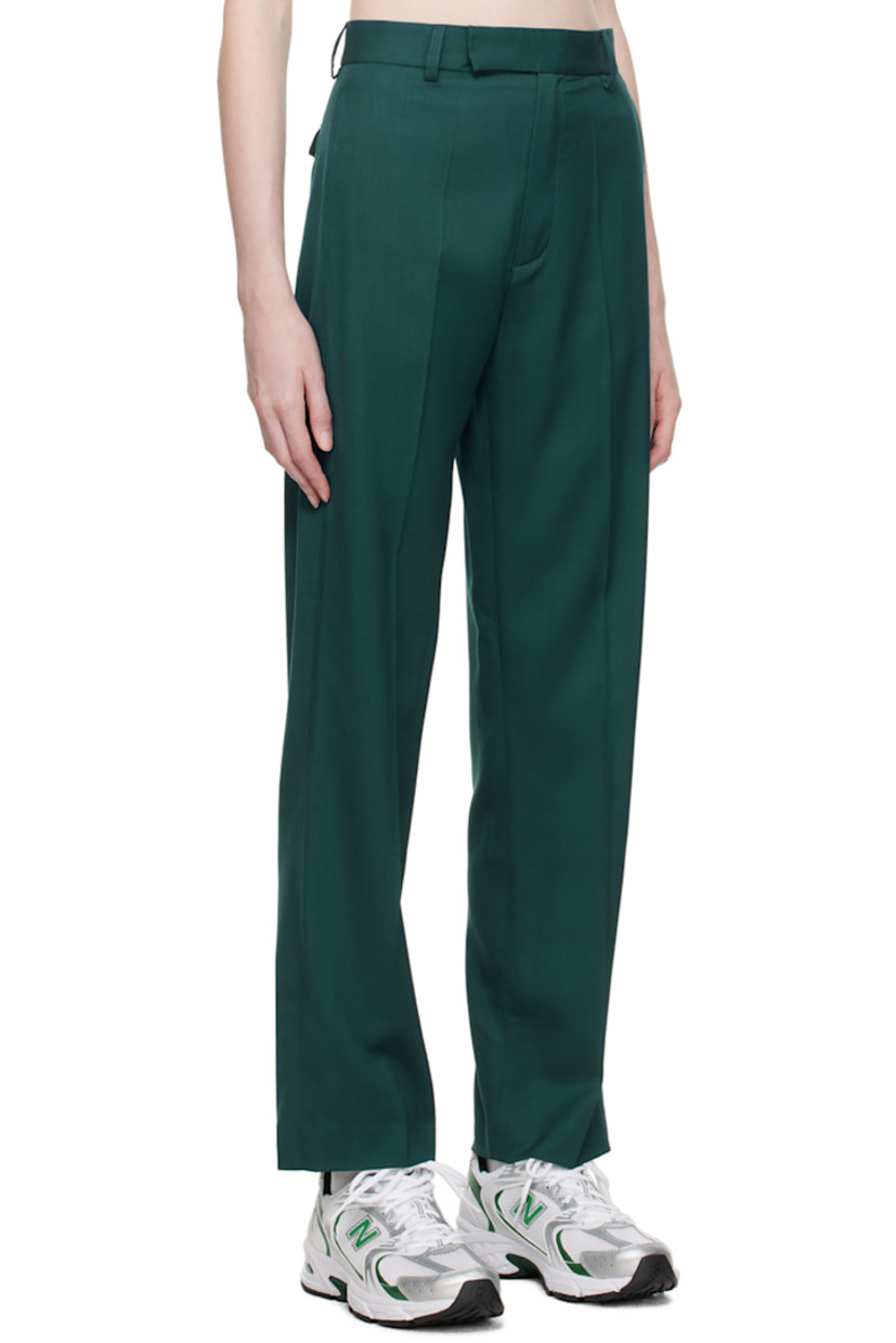 Merino wool delaine trousers. 

· Belt loops 
· Four-pocket styling 
· Zip-fly 
· Creased legs 

Supplier color: Green