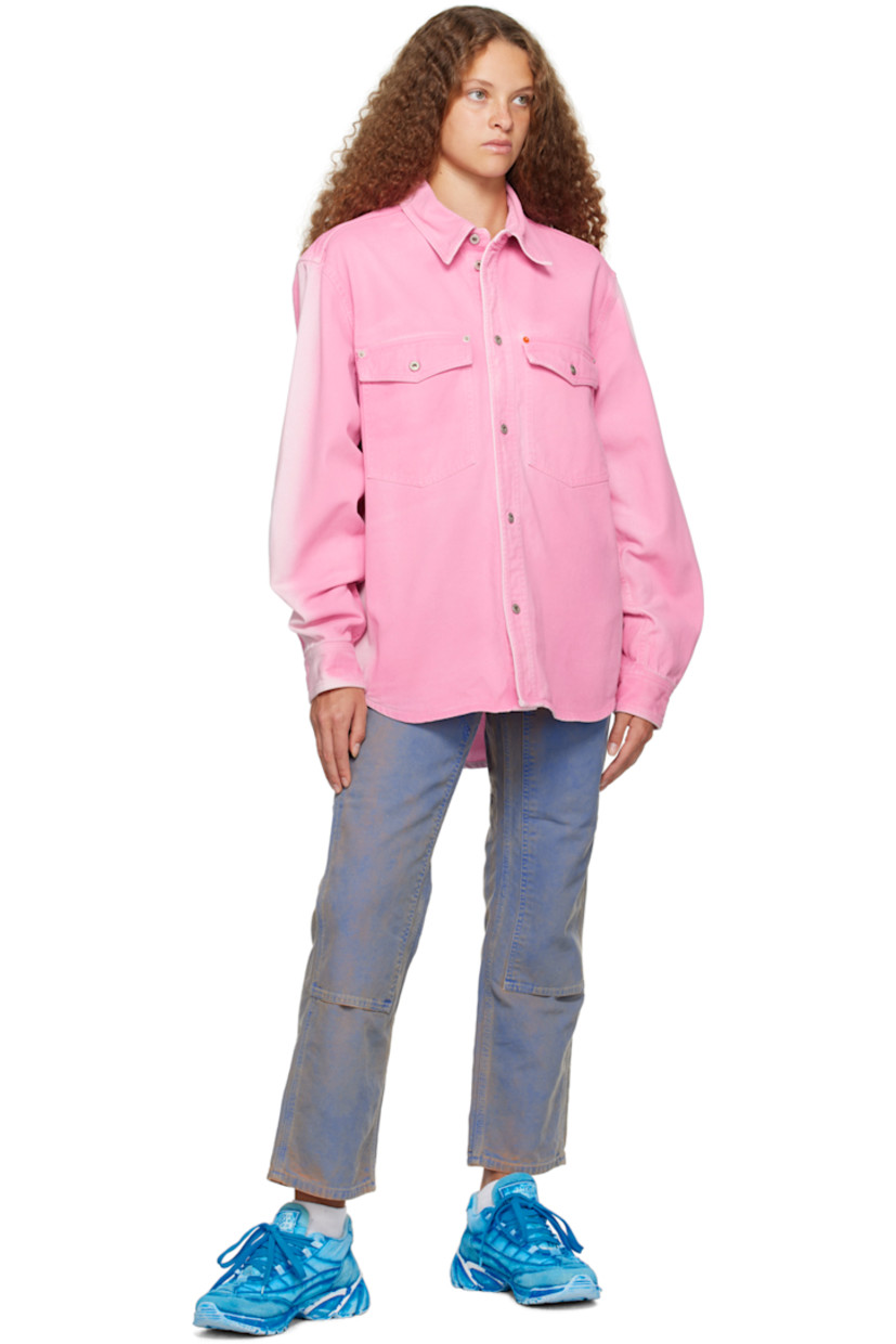 Non-stretch denim jacket. Fading throughout.

· Spread collar
· Button closure 
· Flap pockets
· Shirttail hem
· Logo patch at sleeve
· Single-button barrel cuffs
· Keeper loop and box pleat at back yoke 
· Unlined

Supplier color: Fuchsia pink