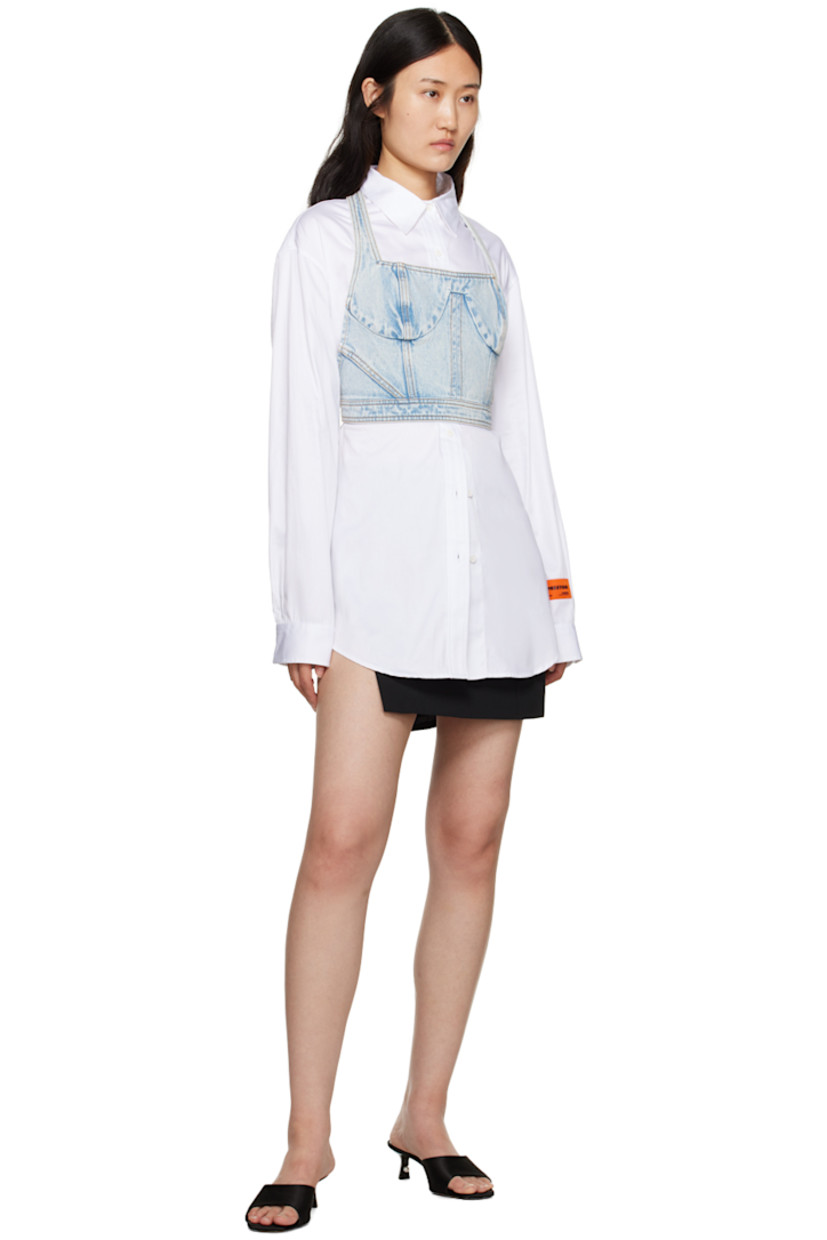 Stretch viscose-blend gabardine skirt.

· High-rise
· Belt loops and logo patch at waistband
· Two-pocket styling
· Zip-fly
· Pinched seams at front and back
· Cutouts at sides
· Full satin lining

Supplier color: Black