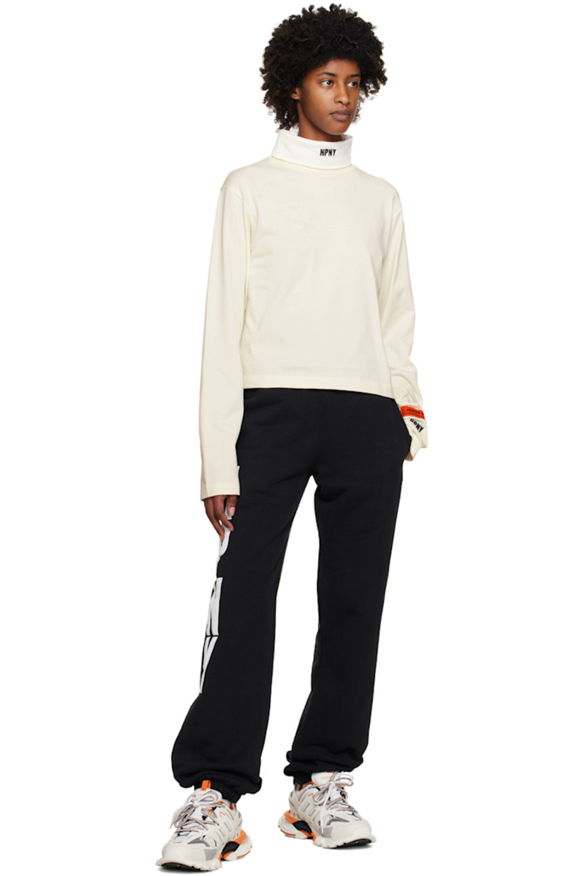 Cotton jersey turtleneck.

· Logo embroidered at collar and cuff 
· Logo patch at cuff 

Supplier color: White/Black/White