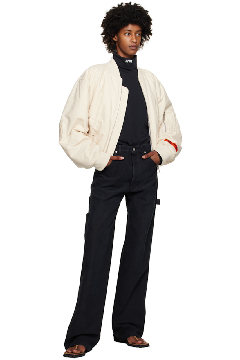 Cotton jersey turtleneck.

· Logo embroidered at collar and cuff 
· Logo patch at cuff 

Supplier color: Black/White