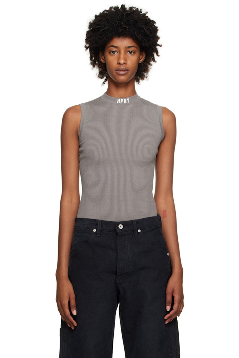Rib knit viscose- and polyester-blend bodysuit. 

· Logo embroidered at round neck 
· Press-stud fastening at bottom
· Logo patch at back collar 
· Partially lined 

Supplier color: Grey/White