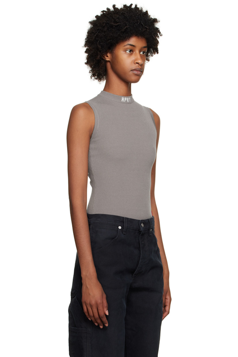 Rib knit viscose- and polyester-blend bodysuit. 

· Logo embroidered at round neck 
· Press-stud fastening at bottom
· Logo patch at back collar 
· Partially lined 

Supplier color: Grey/White