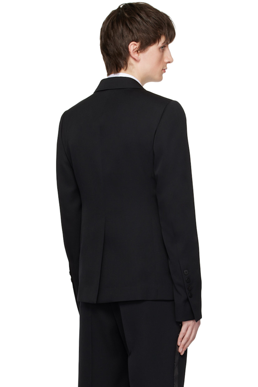 Wool gabardine blazer. 

· Metallic thread detailing at notched lapel
· Single-button closure
· Flap pockets
· Darts at front and back
· Padded shoulders
· Four-button surgeon's cuffs
· Central vent at back hem
· Welt pockets at interior
· Partial satin lining
· Horn hardware

Supplier color: Black/Silver