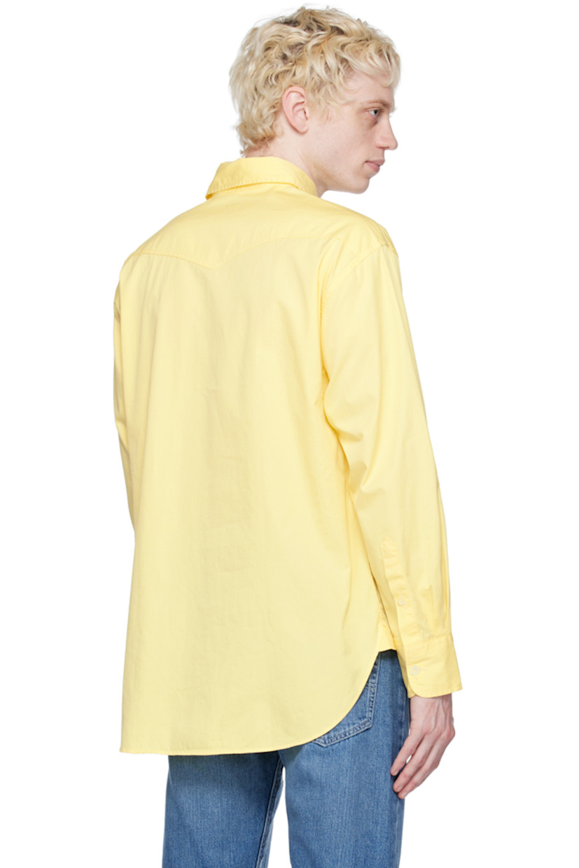 Garment-dyed cotton twill shirt.

· Spread collar
· Button closure
· Flap pockets
· Shirttail hem
· Single-button barrel cuffs
· Mother-of-pearl hardware

Supplier color: Citron