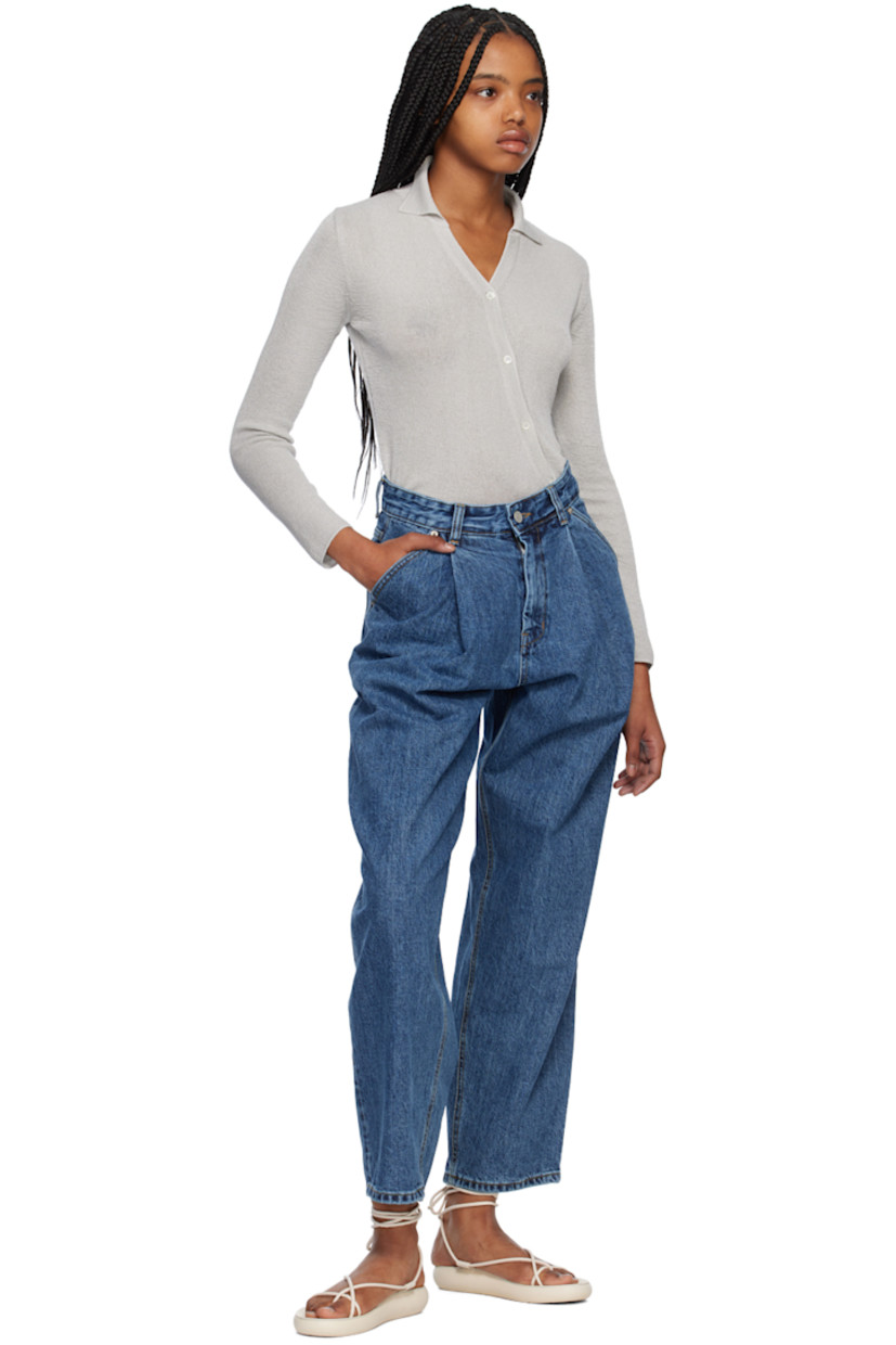 Wide-leg 14 oz non-stretch organic cotton Okayama denim jeans. 

· Belt loops
· Zip-fly
· Four-pocket styling
· Pleated front
· Leather logo patch at back waistband
· Contrast stitching in tan

Supplier color: Medium blue