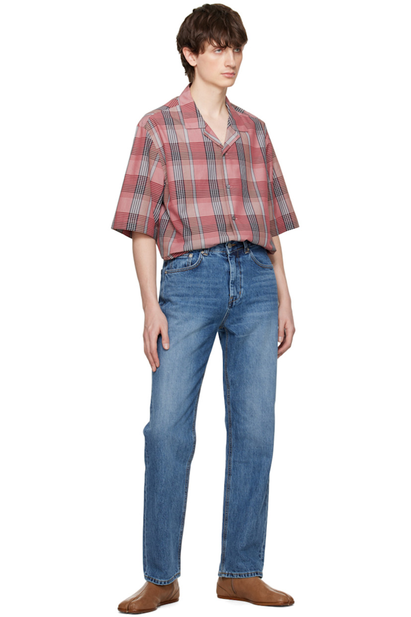 Non-stretch Okayama organic cotton denim jeans. Fading and whiskering throughout. 

· Belt loops
· Five-pocket styling
· Zip-fly
· Leather logo patch at back waistband
· Logo-engraved silver-tone hardware

Supplier color: Medium blue