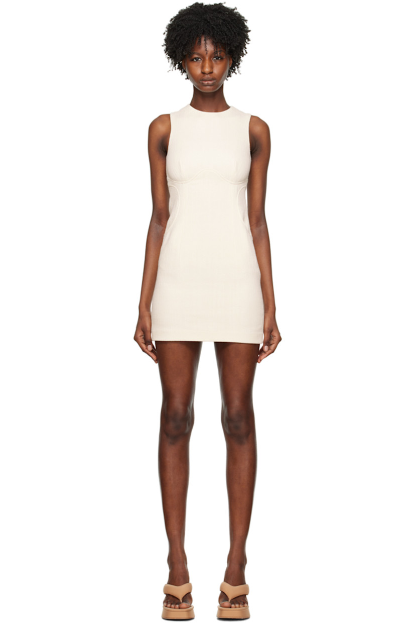Textured woven organic cotton dress.

· Round neck
· Seam pockets
· Concealed zip closure at back collar
· Full logo-woven satin lining

Supplier color: Egret