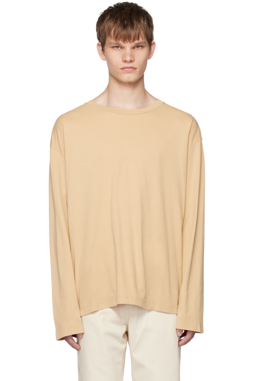 Heavyweight cotton jersey T-shirt.  

· Rib knit crewneck
· Dropped shoulders
· Graphic printed at back

Supplier color: Beige sunlight print