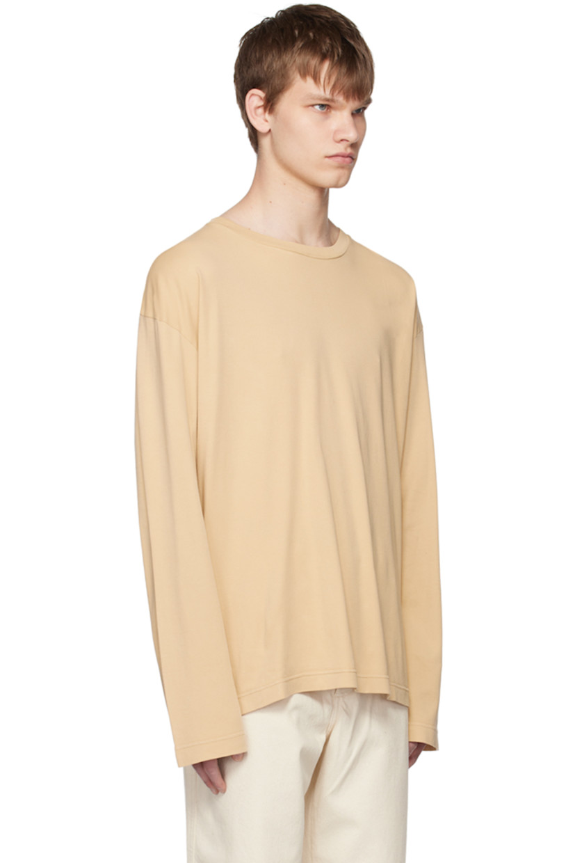Heavyweight cotton jersey T-shirt.  

· Rib knit crewneck
· Dropped shoulders
· Graphic printed at back

Supplier color: Beige sunlight print
