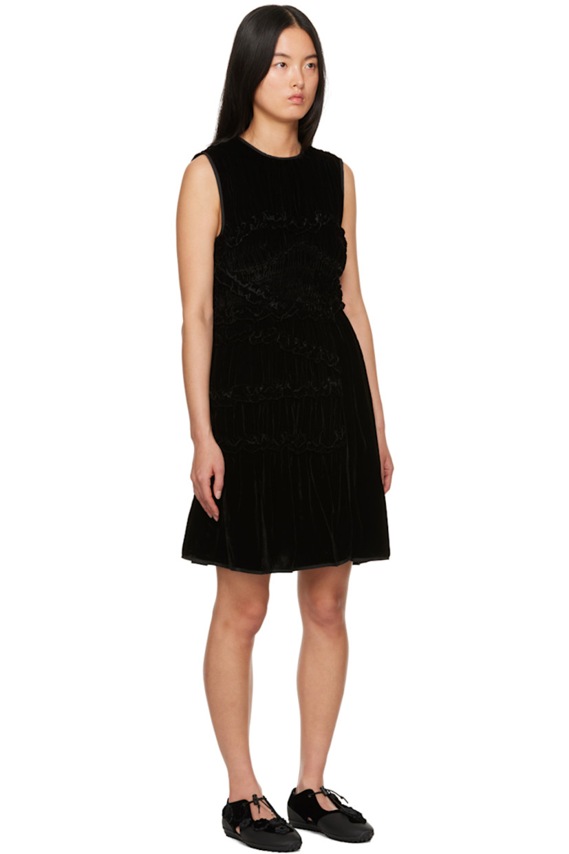 Viscose- and silk-blend velvet dress. Ruffled trim, shirring, and gathering throughout.

· Round neck
· Concealed zip closure at back

Supplier color: Black