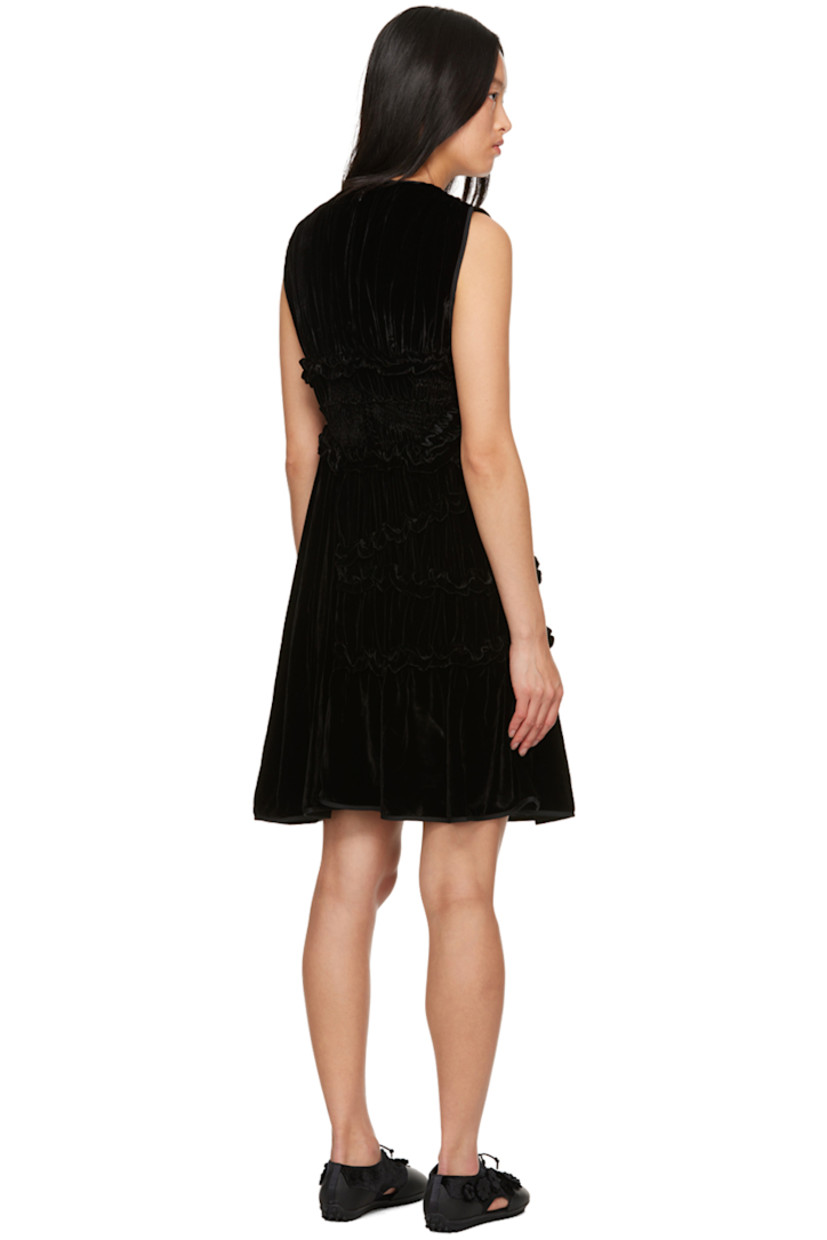 Viscose- and silk-blend velvet dress. Ruffled trim, shirring, and gathering throughout.

· Round neck
· Concealed zip closure at back

Supplier color: Black