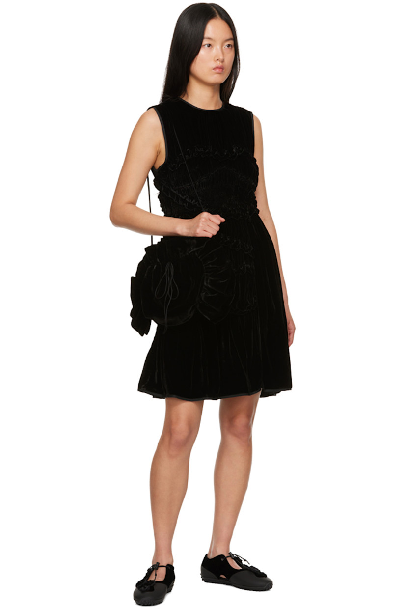 Viscose- and silk-blend velvet dress. Ruffled trim, shirring, and gathering throughout.

· Round neck
· Concealed zip closure at back

Supplier color: Black