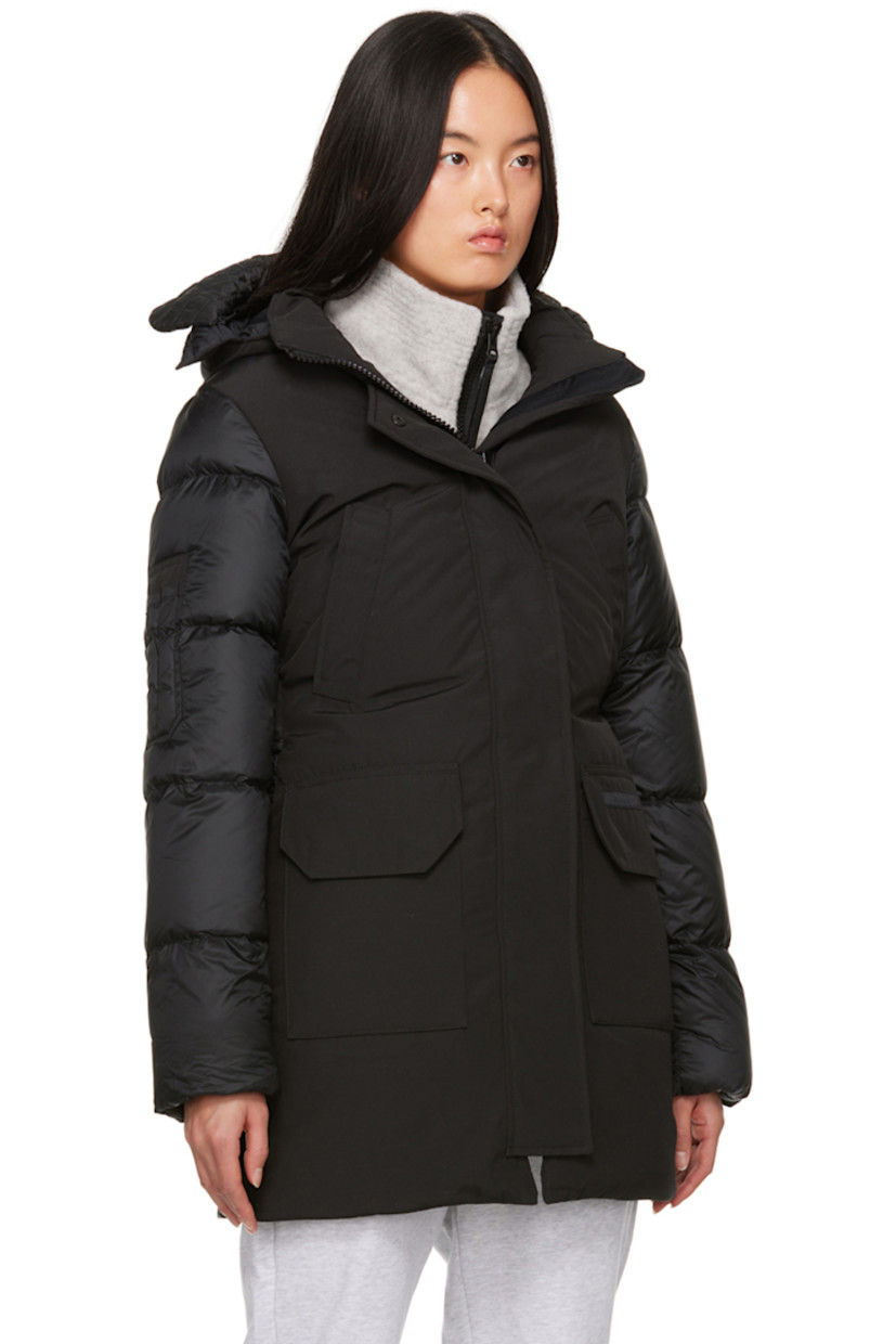 Lightweight and water-repellent RDS-certified down-filled Arctic Tech® polyester- and cotton-blend canvas and nylon ripstop jacket. 

· Paneled construction
· Detachable brim and cinch strap at detachable hood
· Bungee-style drawstring at stand collar
· Zip closure with press-stud placket
· Logo patch at front
· Welt pockets and flap pockets
· Concealed bungee-style drawstring at waist
· Logo patch and utility pocket at sleeve
· Inset rib knit cuffs
· Logo patch and webbing strap at back 
· Logo-woven shoulder straps at interior
· Zip pocket and patch pockets at interior
· Full nylon satin lining

Part of the Black Label collection.

Supplier color: Black

Fill: 90% duck down, 10% duck feather.